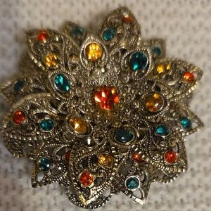 Elegant Silver Floral Brooch with Multicolor Gems